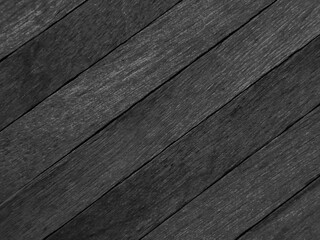 Background of black tone popsicle sticks with diagonal view.	