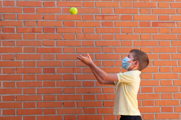 girl with a brick wall