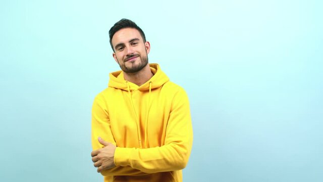 Young caucasian man doubting and confused, thinking of an idea or worried about something