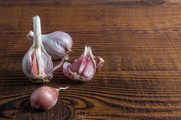 cloves of garlic on a board