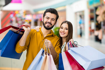 Portrait of his he her she nice attractive lovely glad cheerful cheery couple having fun carrying...