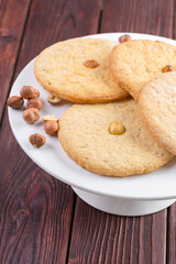 Oat cookies served on wooden table close up
