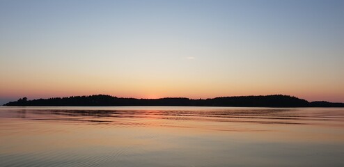 Obraz premium sunset over the river
