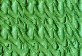 Green cosmetic clay (cucumber facial mask, avocado face cream, matcha body wrap) texture close up,...
