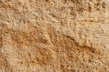 Yellow stone texture, close up. Perfect natural background