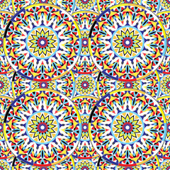 Seamless repeating pattern of colored mandalas