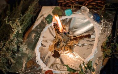 Candle for cleansing a person, magic rituals and wax casting, energy cleansing. Altar of modern witch.
