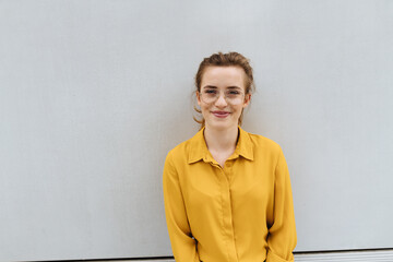 Happy young woman with a vivacious smile