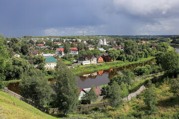 Fototapeta na wymiar View from the ramparts of the Tvertsa river and the city of Torzhok