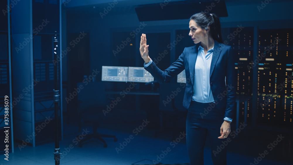 Poster in modern data center research laboratory beautiful confident woman does virtual reality activating 