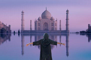 Panoramic view of Taj Mahal at sunset reflected in water - Agra , Uttar Pradesh, India