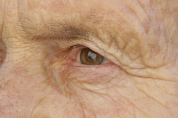 Obraz premium Close up image of eyes of elderly woman 