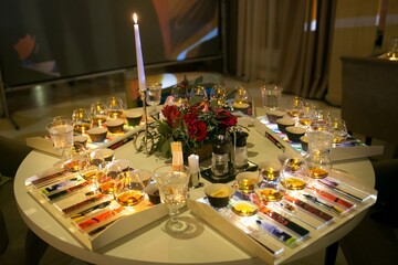 Laid table with food and drinks for a festive event