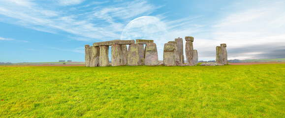 Panoramic view of Stonehenge at cloudy sky with full moon - United Kingdom   "Elements of this image furnished by NASA"