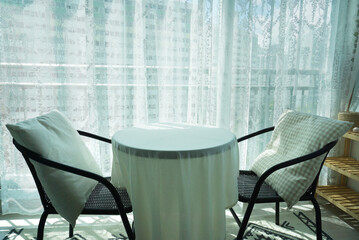 tables and chairs in the home cafe under the sun