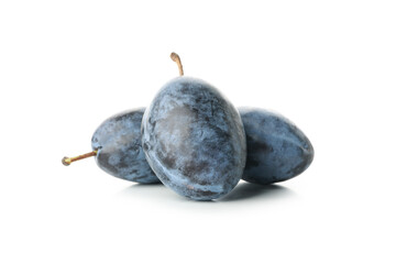 Fresh blue plums isolated on white background