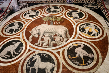 Marvelous close-up view of the inlaid marble mosaic floor of the Duomo di Siena depicting the...