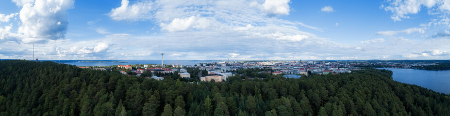 Aerial panoramic view of beautiful city Tampere in Finland at summer. Blue sky with clouds. Europe.