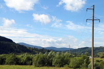 power line pole on a beautiful mountain landscape
