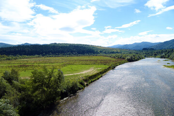 Obraz premium summer landscape with mountains and river