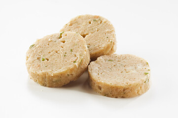 Sliced German bread dumplings on white