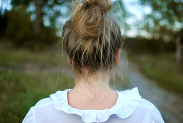 The back of the head of a young woman 