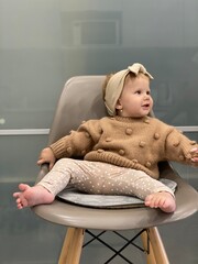 baby in a chair