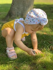 little girl playing with ball