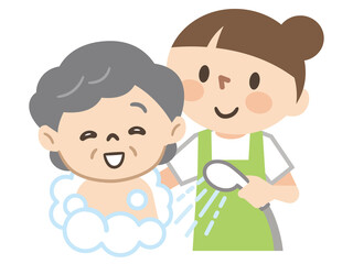 高齢女性に入浴介助を行う女性介護士