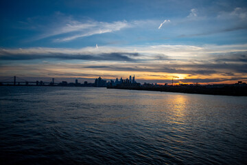 Naklejka premium A Dramatic Orange and Blue Sunset at Graffiti Pier