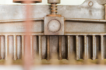 Close up of industrial machine at rest in abandoned factory