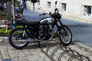 Obraz na płótnie Canvas Old retro motorcycle on the street