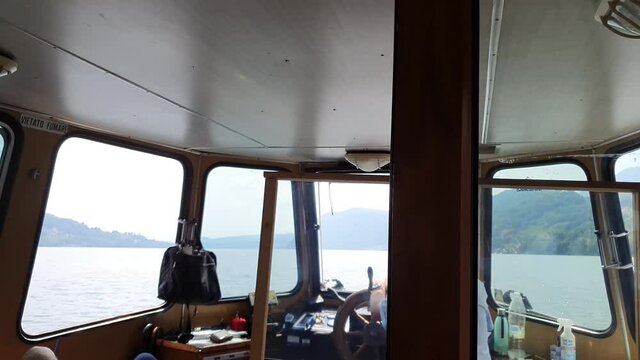 boat cabin with rudder and helmsman