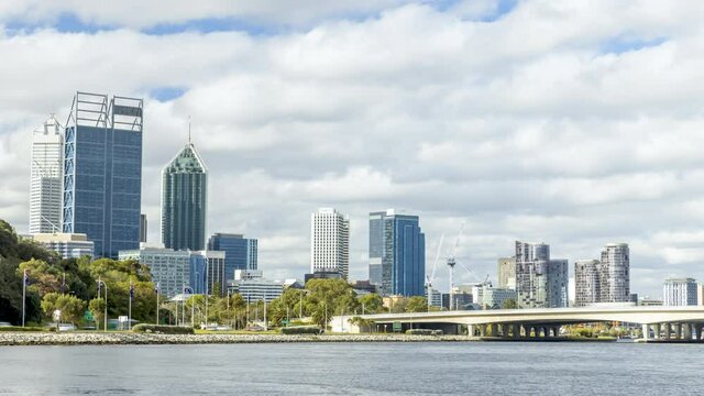 Timelapse of Perth city CBD during the day showing clouds moving. Moving cloud-scape, Business and financial districts of Western Australia. Capital city Tourism.