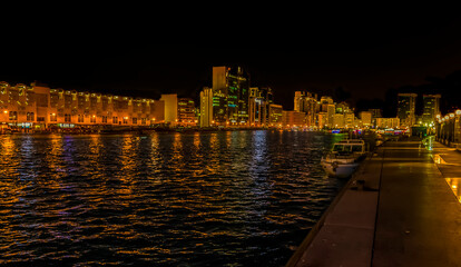 A view up the Dubai Creek at night in Dubai, UAE in springtime