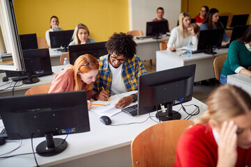 Young people in classroom learning