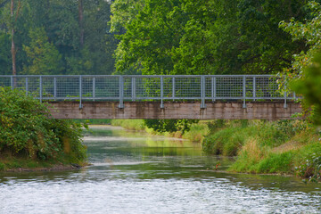 A walking path bridge over water