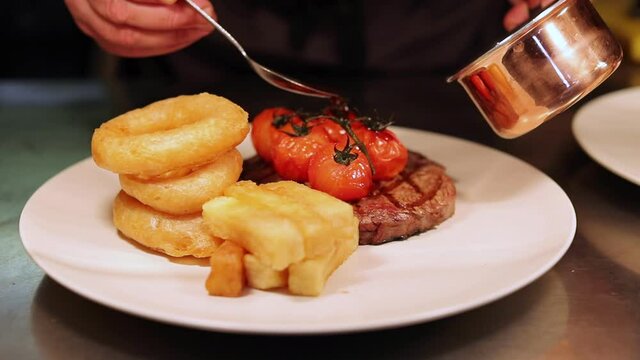 gourmet steak with gravy pouring