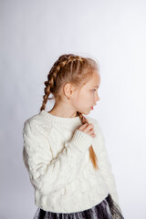 beautiful teenage girl in a warm knitted sweater