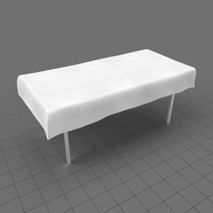Dining table with tablecloth