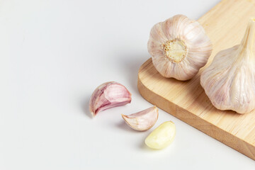 Fresh garlic, isolated on white background.