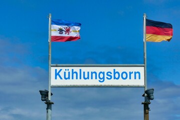 german and city flag of rostock on sign of kuehlungsborn