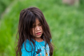 girl playing on the grass