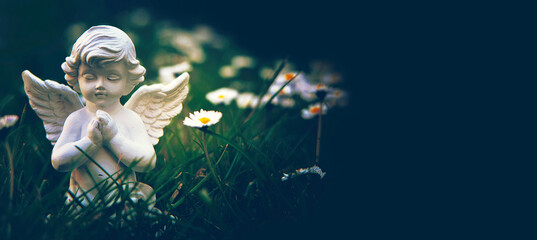 Guardian angel kneeling and praying