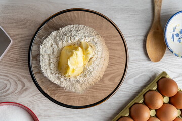 Butter in a bowl of flour
