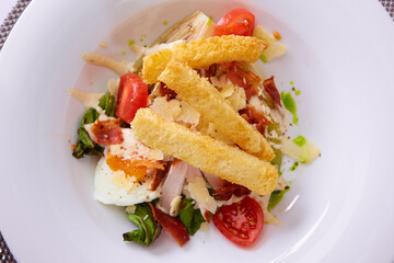 Plate with fresh caesar salad. Shallow dof.