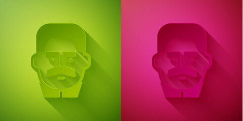 Paper cut Portrait of Joseph Stalin icon isolated on green and pink background. Paper art style. Vector.