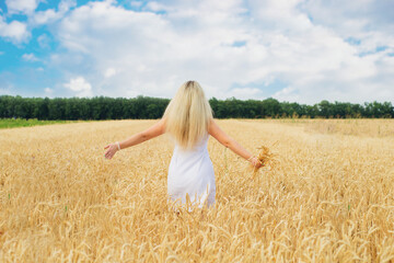 young woman in wheat field