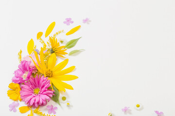 Obraz na płótnie Canvas yellow and pink flowers on white background