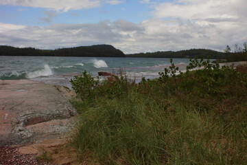 Fototapeta na wymiar landscape of a rock in front of a beach